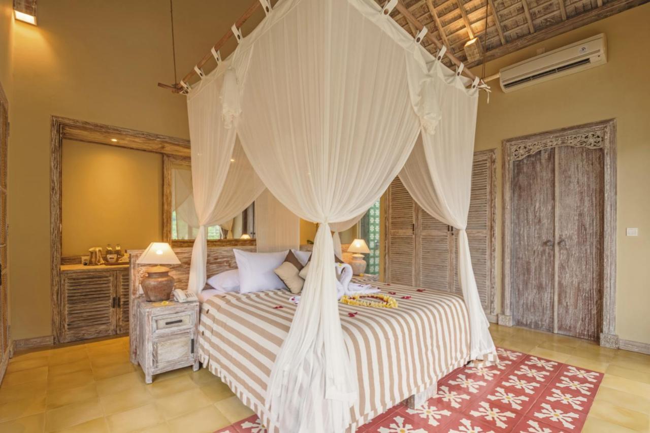 Wapa Di Ume Sidemen Hotel Sidemen  Buitenkant foto A bed with a mosquito net
